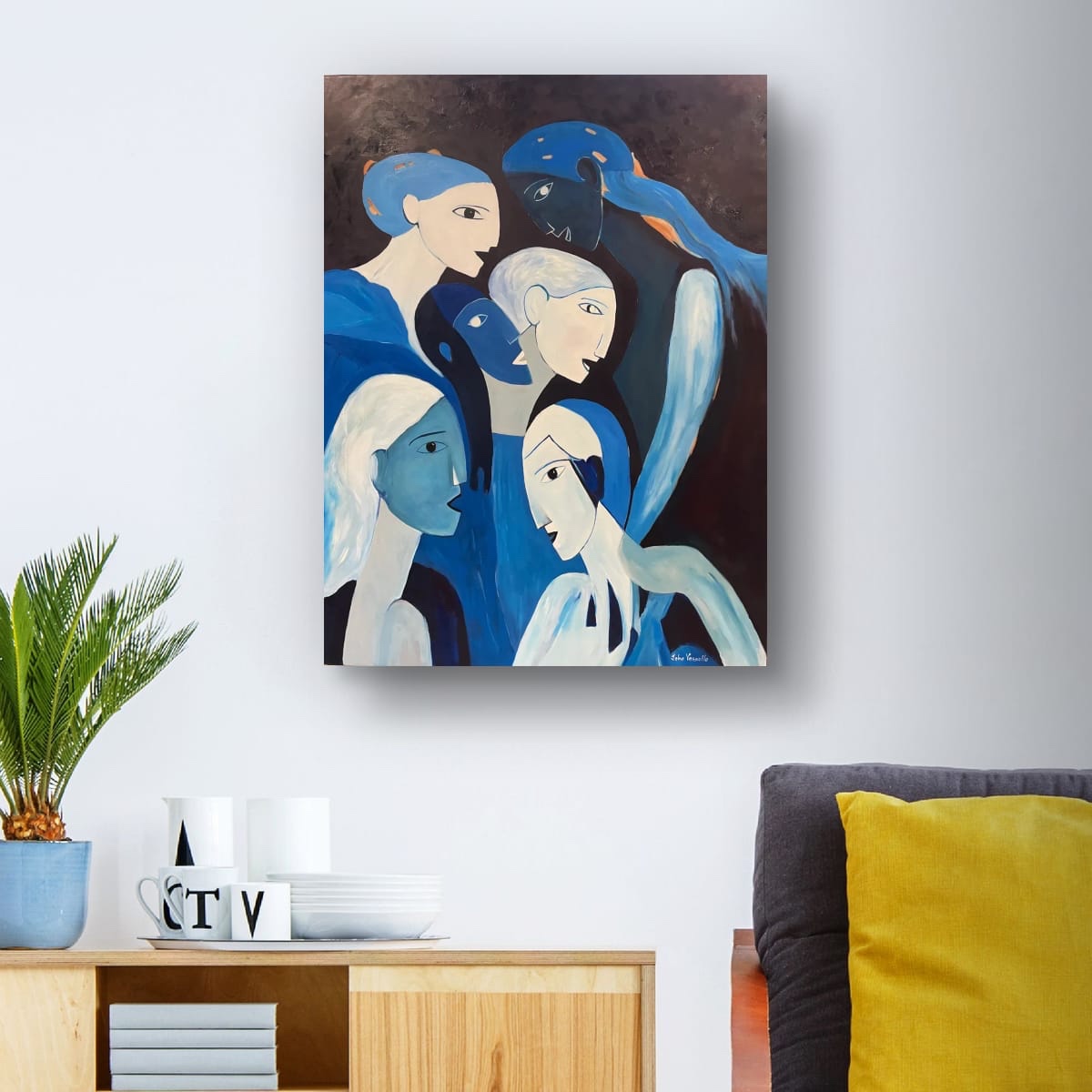 Blue Ensemble" presents a collection of abstract faces intertwined in shades of...