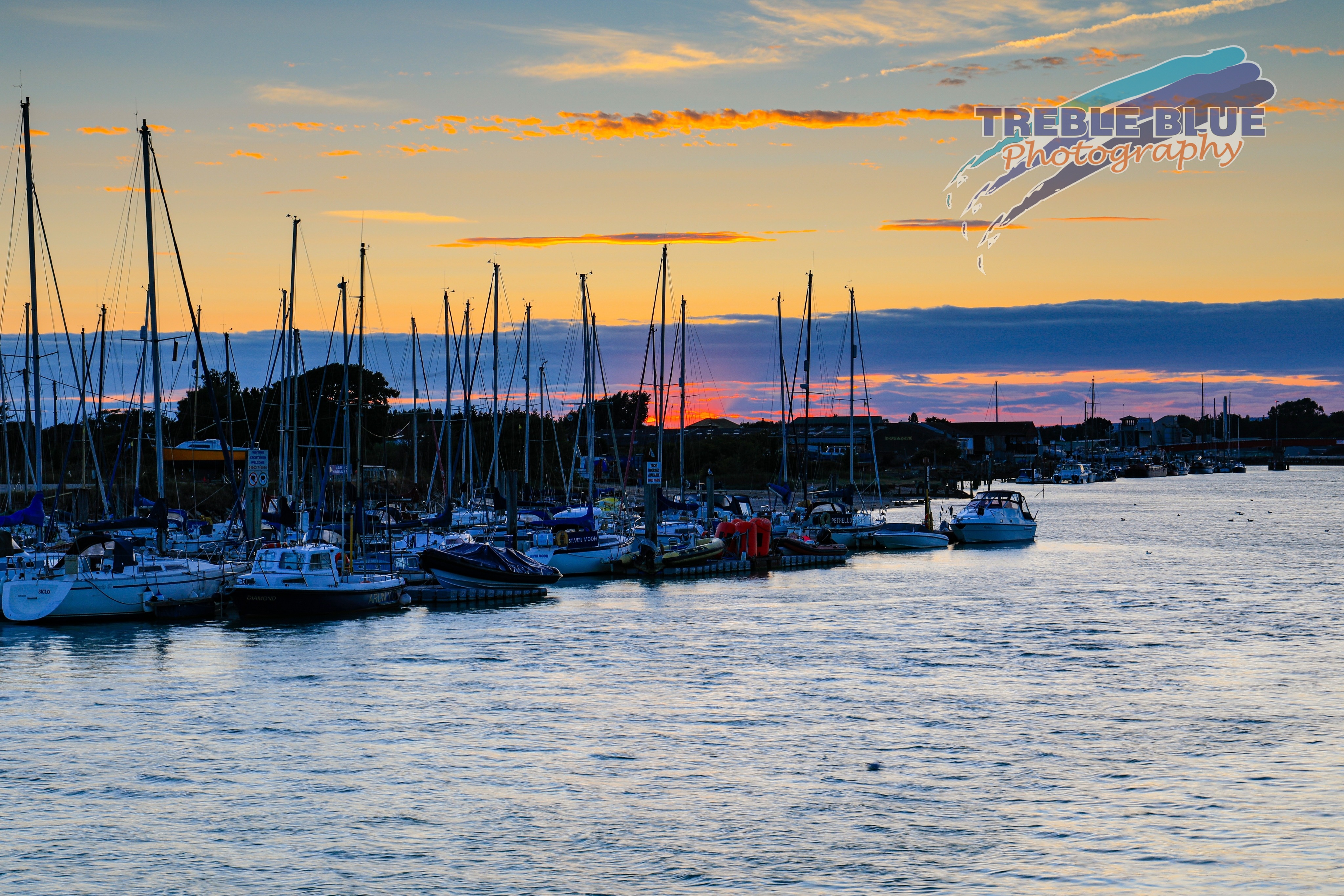 a view of last night's sunset, with the Arun Yacht Club moorings prominent