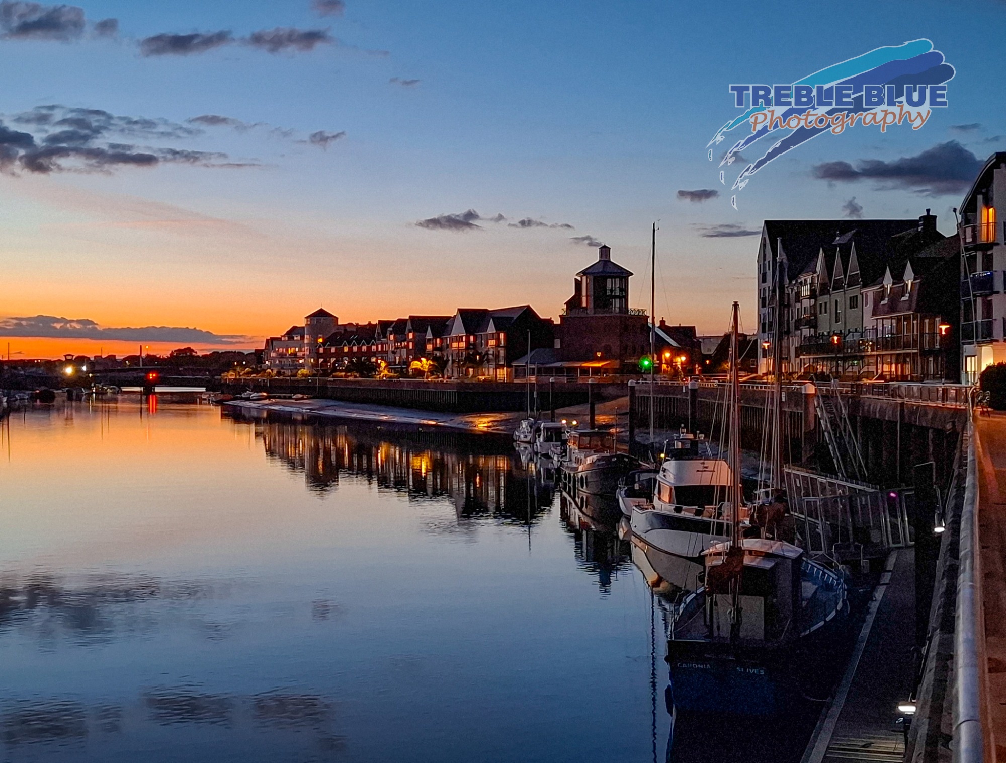 Littlehampton Harbour & quayside lit up and some sunset glow