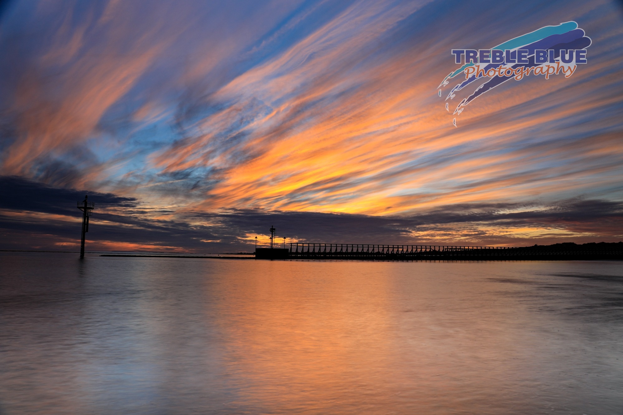 colourful sunset at East Beach, Littlehampton at low tide