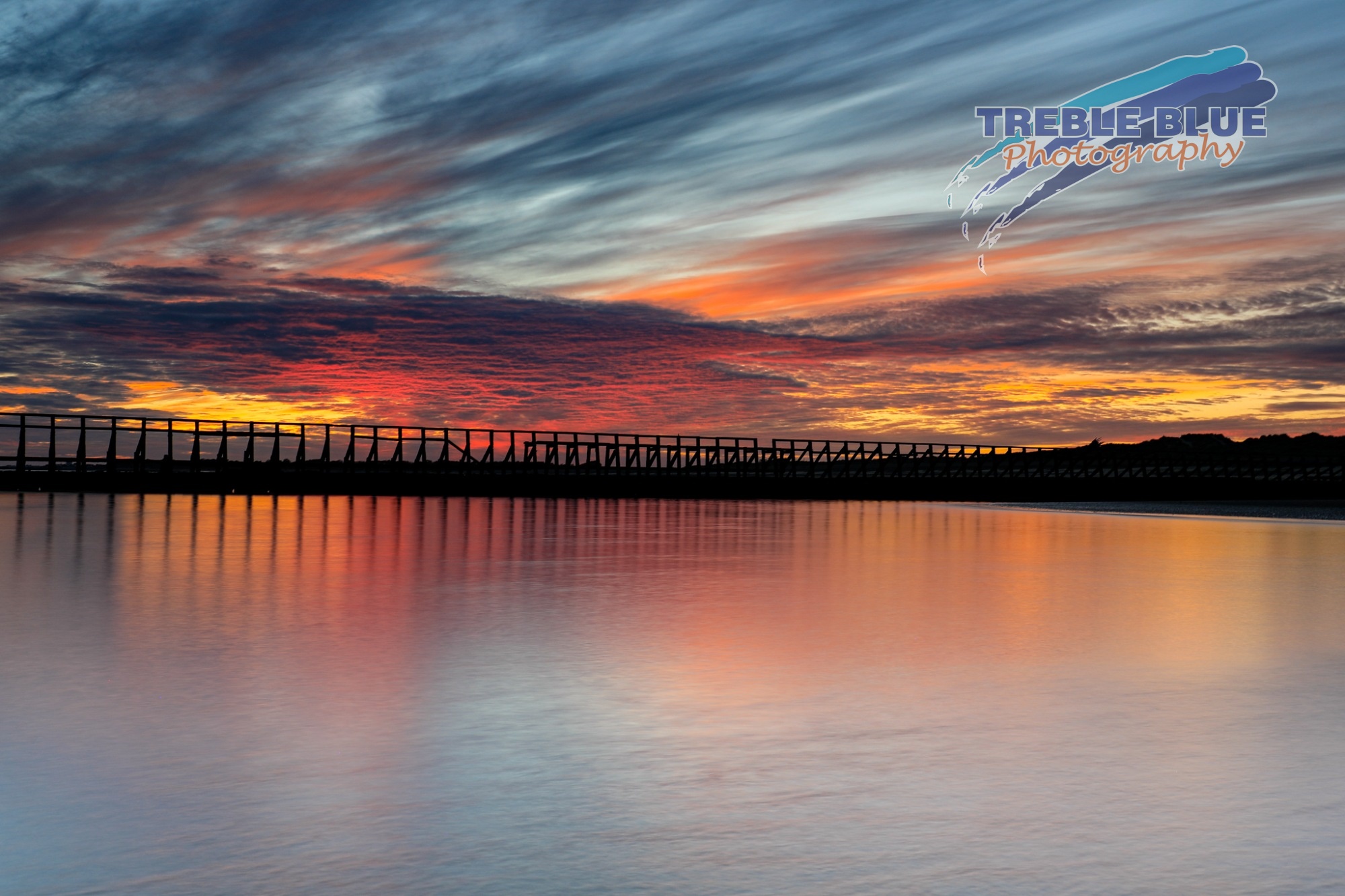 another red sky at sunset at low tide, East Beach, Littlehampton