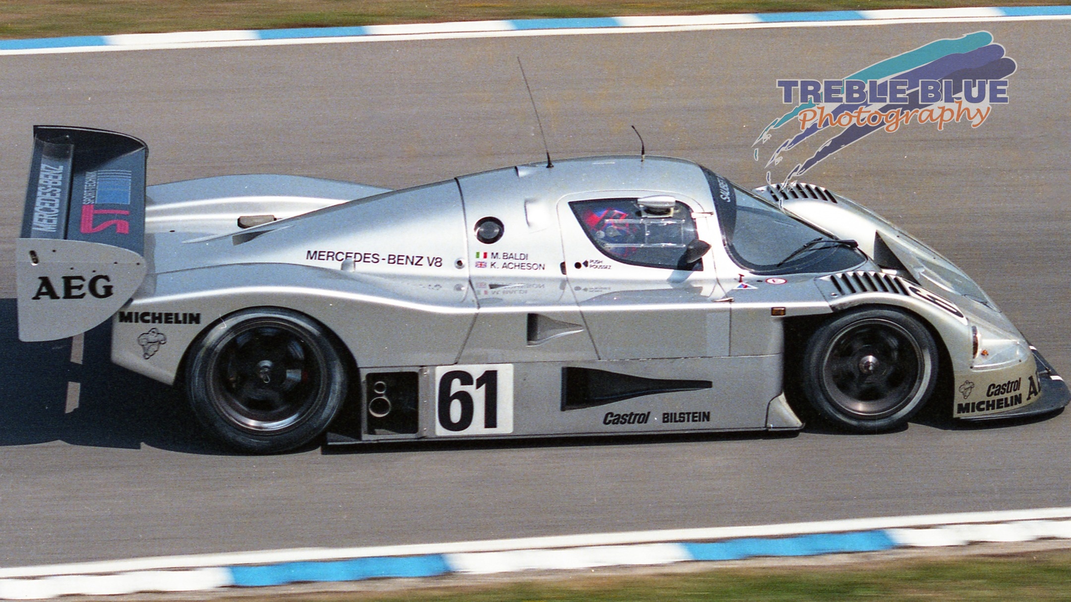 the unmistakeable crash helmet of Kenny Acheson at the wheel of the Sauber C9 Me...